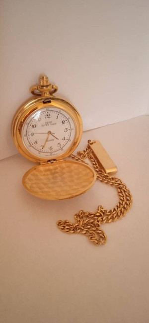 1990- UNIQUE QUARTZ pocket watch golden color with with opening lid and chain